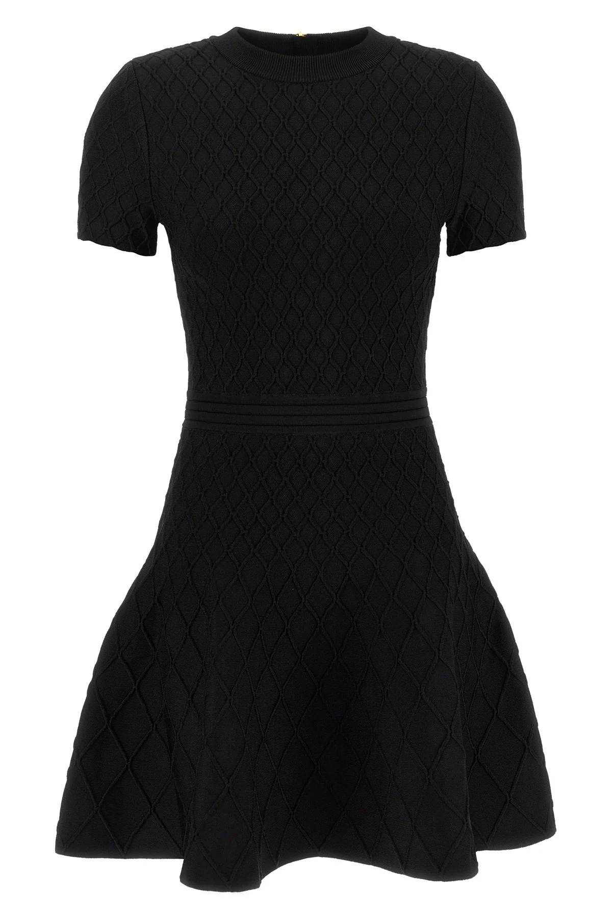 the flared balmain skater dress redefines knitwear codes through an hourglass
