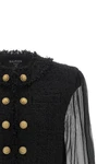 the spencer blazer by balmain redefines the codes of tailoring through a play of