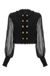 the spencer blazer by balmain redefines the codes of tailoring through a play of
