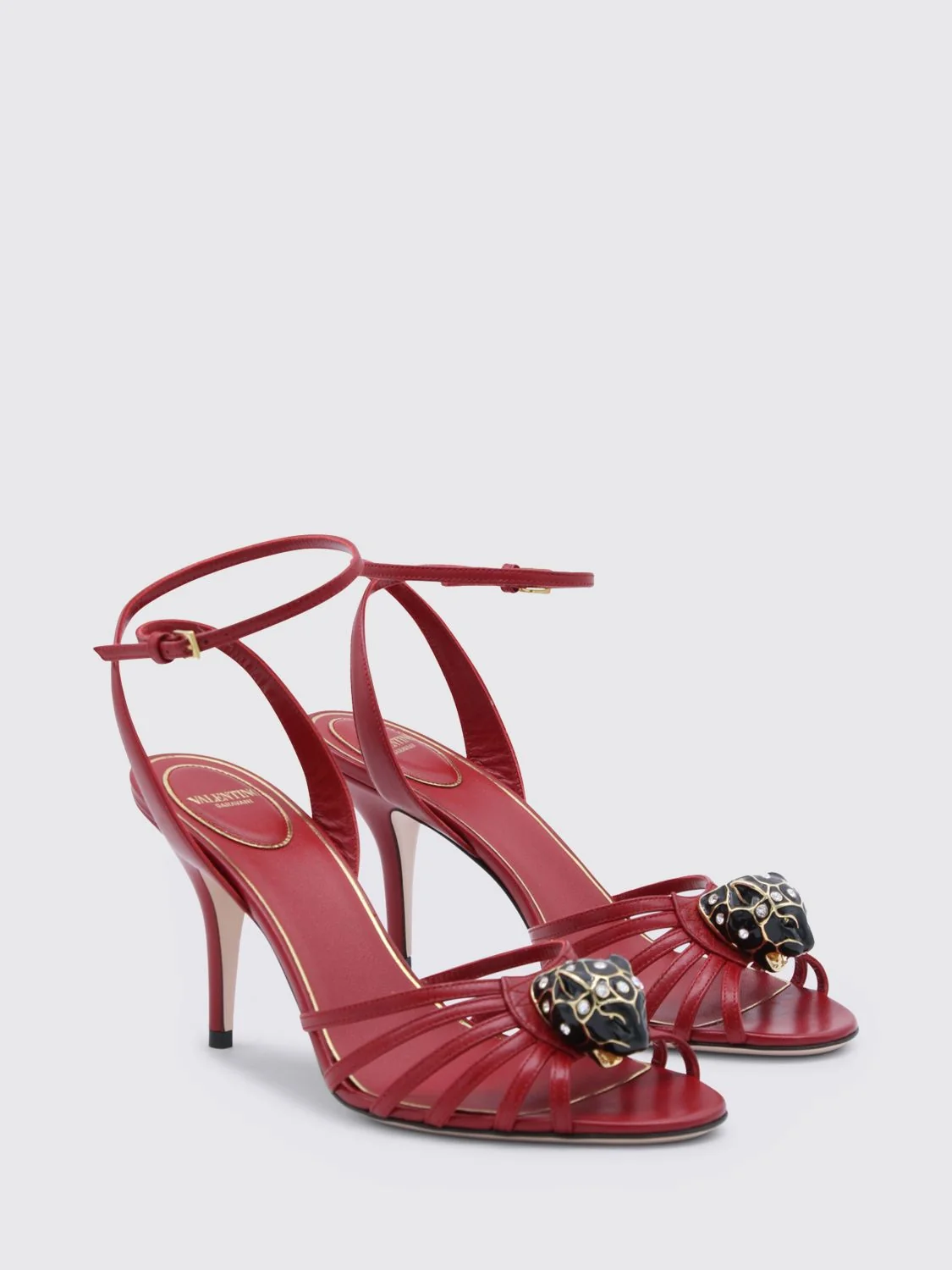 leather sandal with enamelled application pas de chat