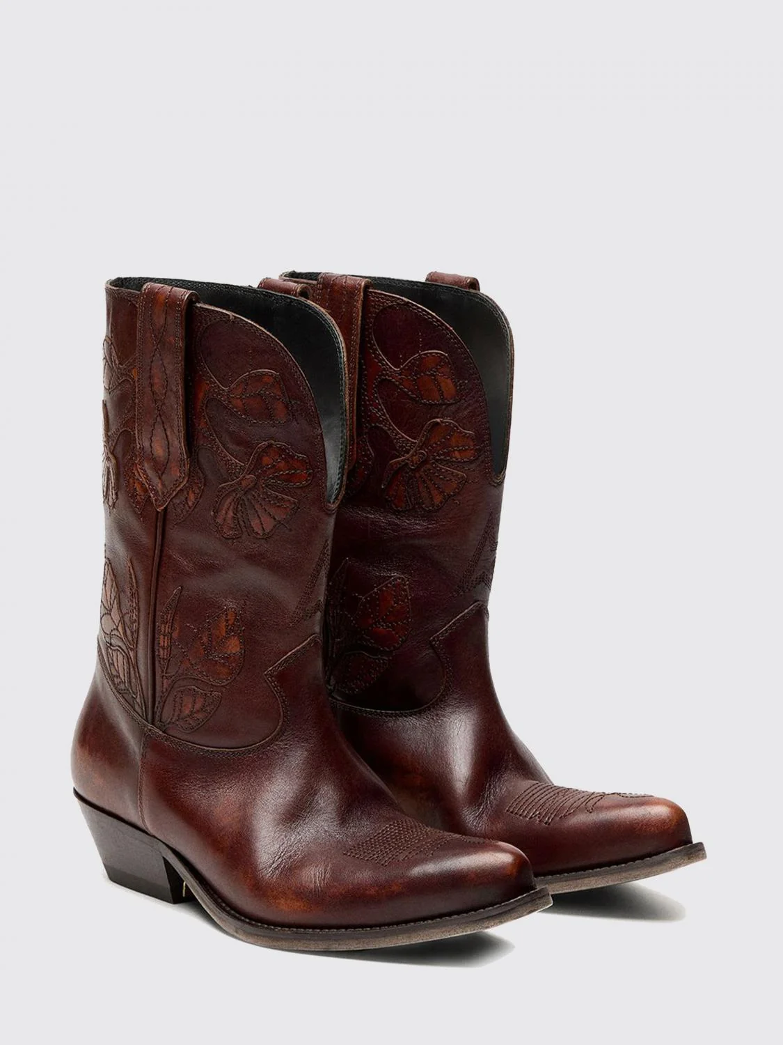 aged leather boots
