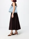 way medium denim shoulder bag with twist-lock closure