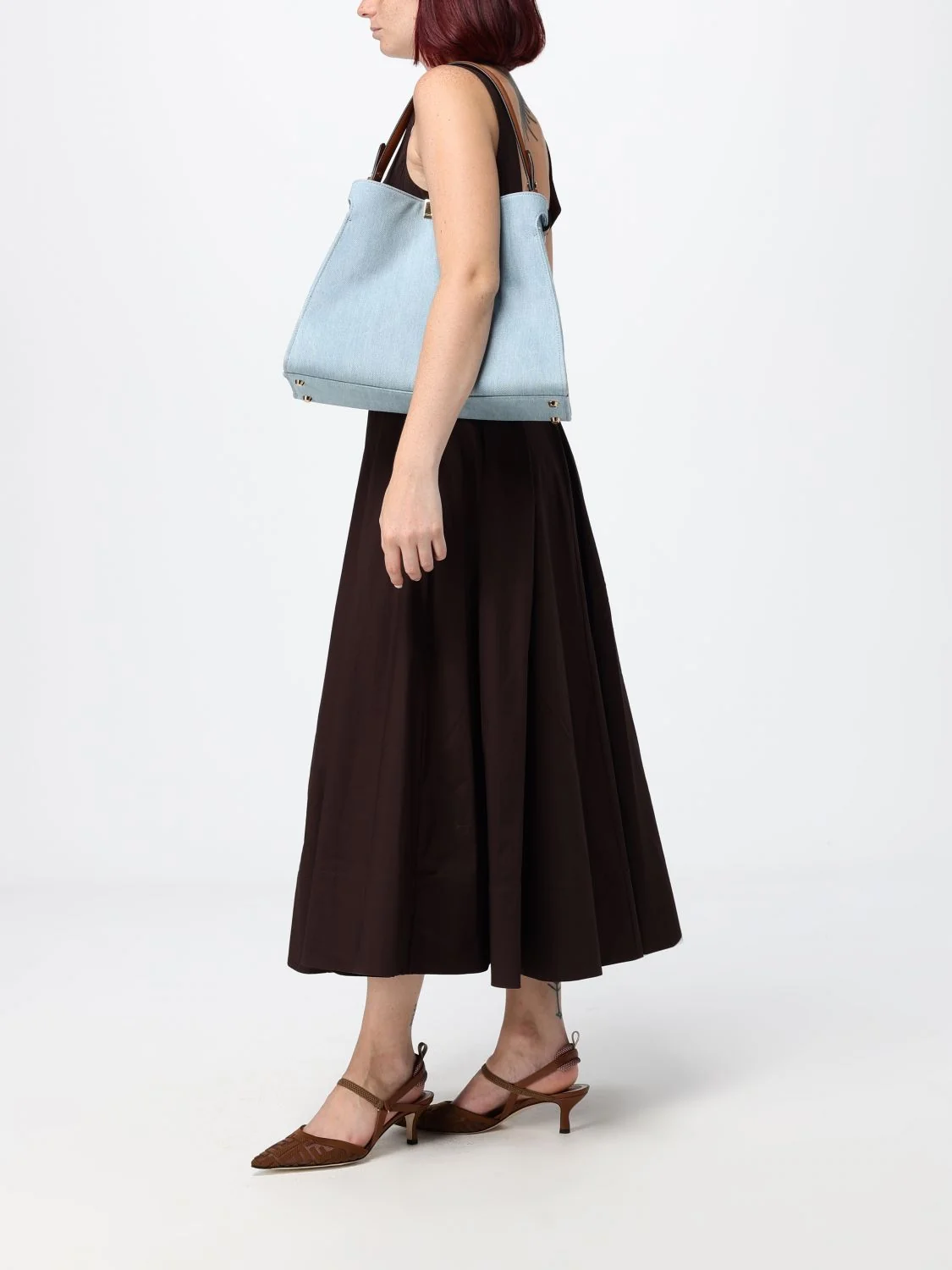 way medium denim shoulder bag with twist-lock closure
