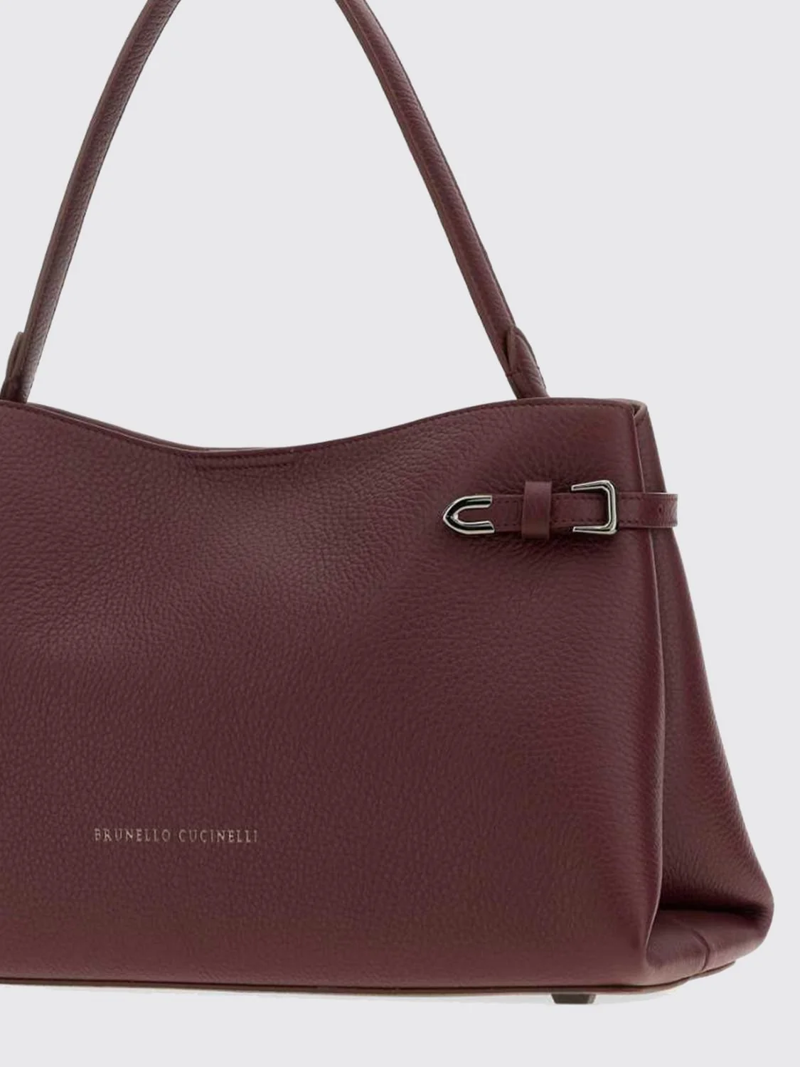 leather shoulder bag with flat handle and magnetic closure