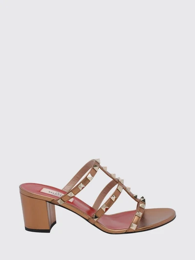 rockstud mule sandals in laminated leather with studs