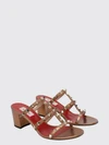 rockstud mule sandals in laminated leather with studs