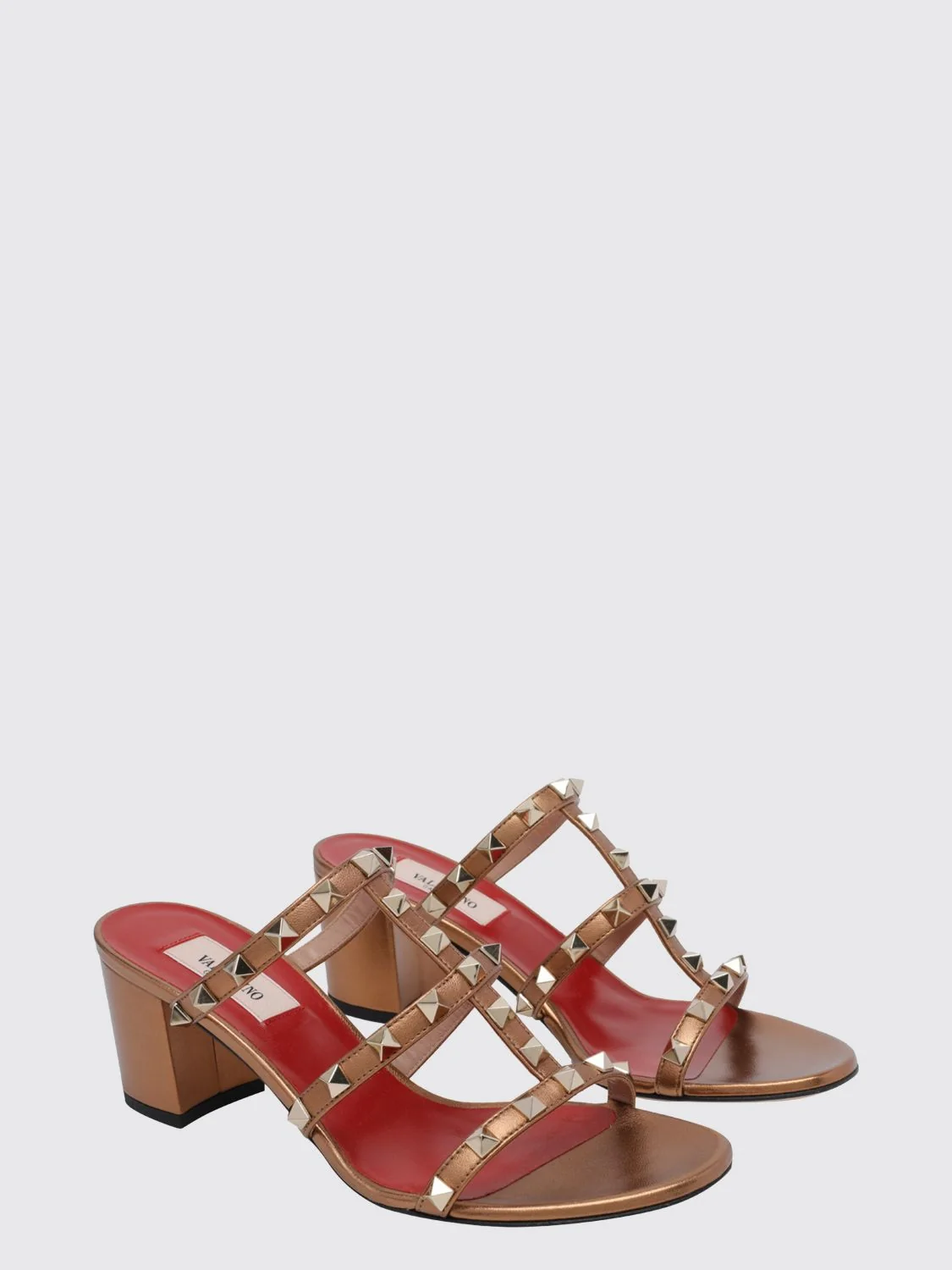 rockstud mule sandals in laminated leather with studs