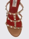 rockstud mule sandals in laminated leather with studs