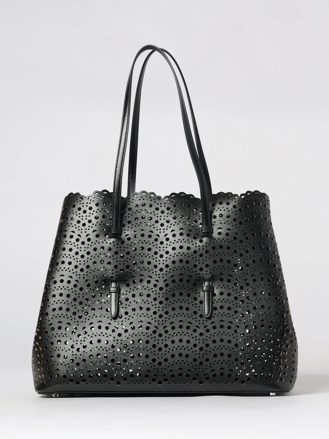 mina shoulder bag in smooth calfskin leather with perforated design and pouch