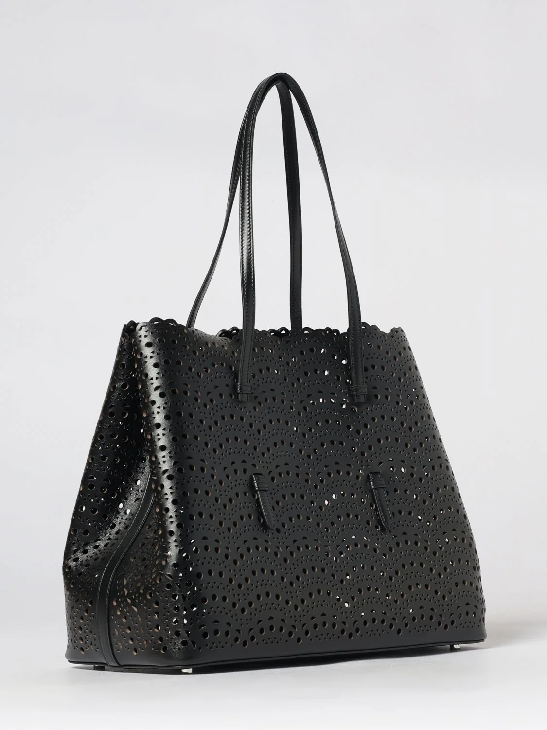 mina shoulder bag in smooth calfskin leather with perforated design and pouch