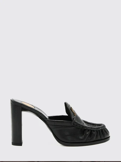 le loafer high-heeled mules in eel leather with ysl monogram