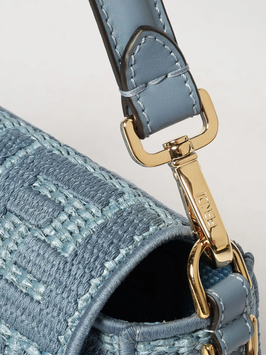 baguette shoulder bag in raffia with ff jacquard monogram and leather handle