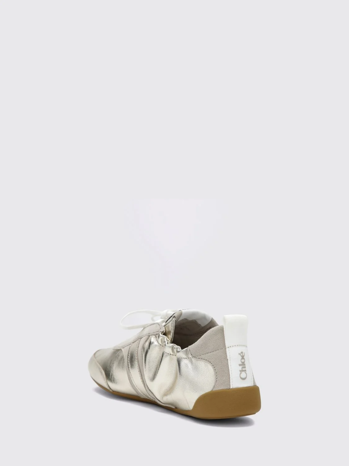 chloé kick low-top sneakers in a mix of smooth, suede, and laminated leather