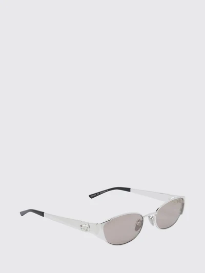gold-tone metal cat-eye sunglasses with oval shape and gg logo
