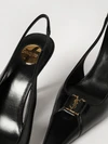 woman's high heel shoes