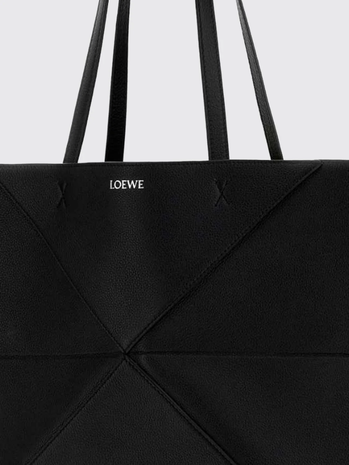 large puzzle fold calfskin leather tote bag with laminated logo