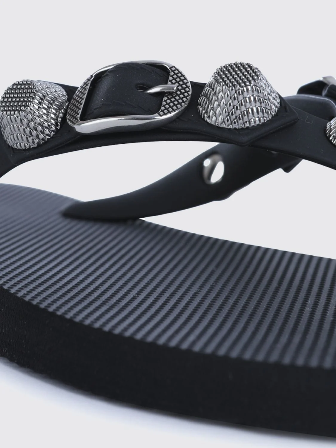 studded rubber thong sandals with decorative buckle