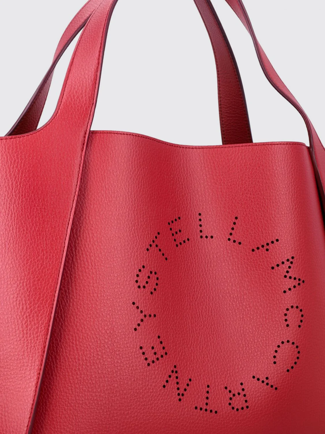 perforated logo handbag in faux leather with pouch