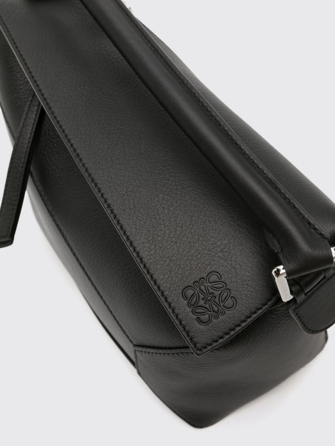 small puzzle edge bag in grained calf leather with anagram
