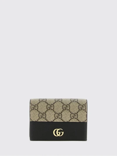 wallet in gg supreme fabric and leather with flap closure