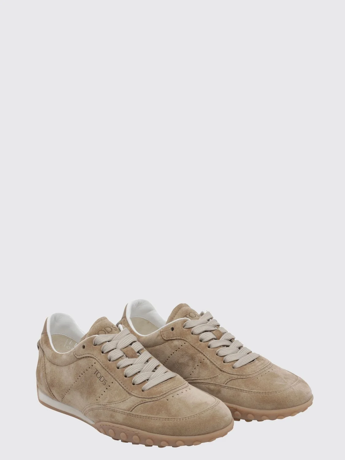 low-top suede sneakers with iconic rubber pebble sole