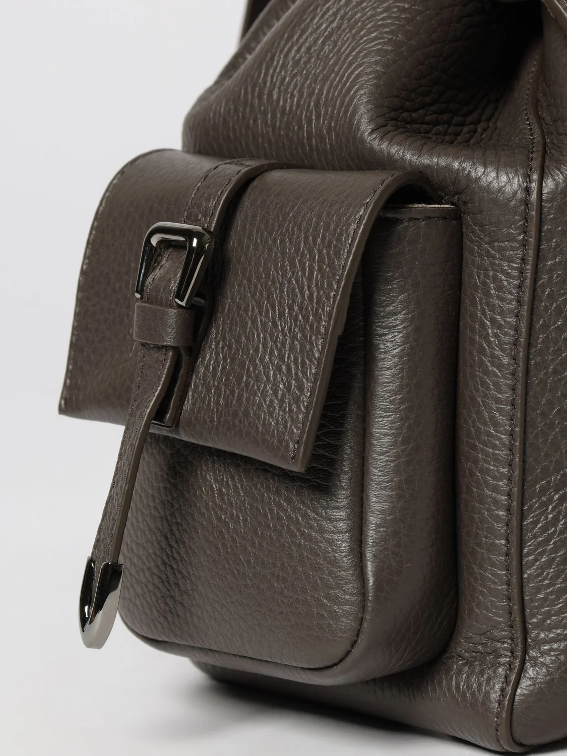 utility backpack in grained leather with snap closure
