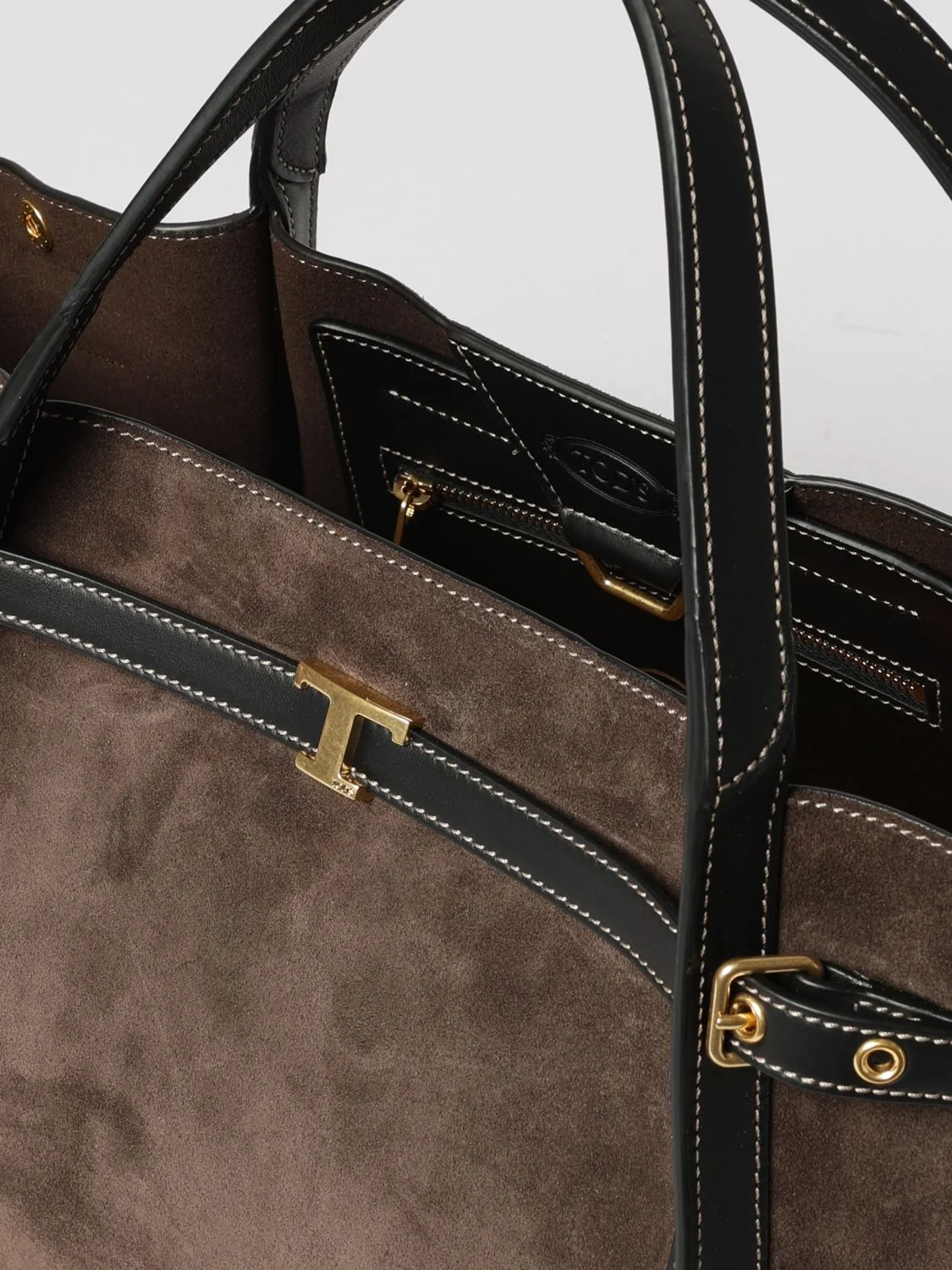 t timeless handbag in suede leather with metal t timeless logo