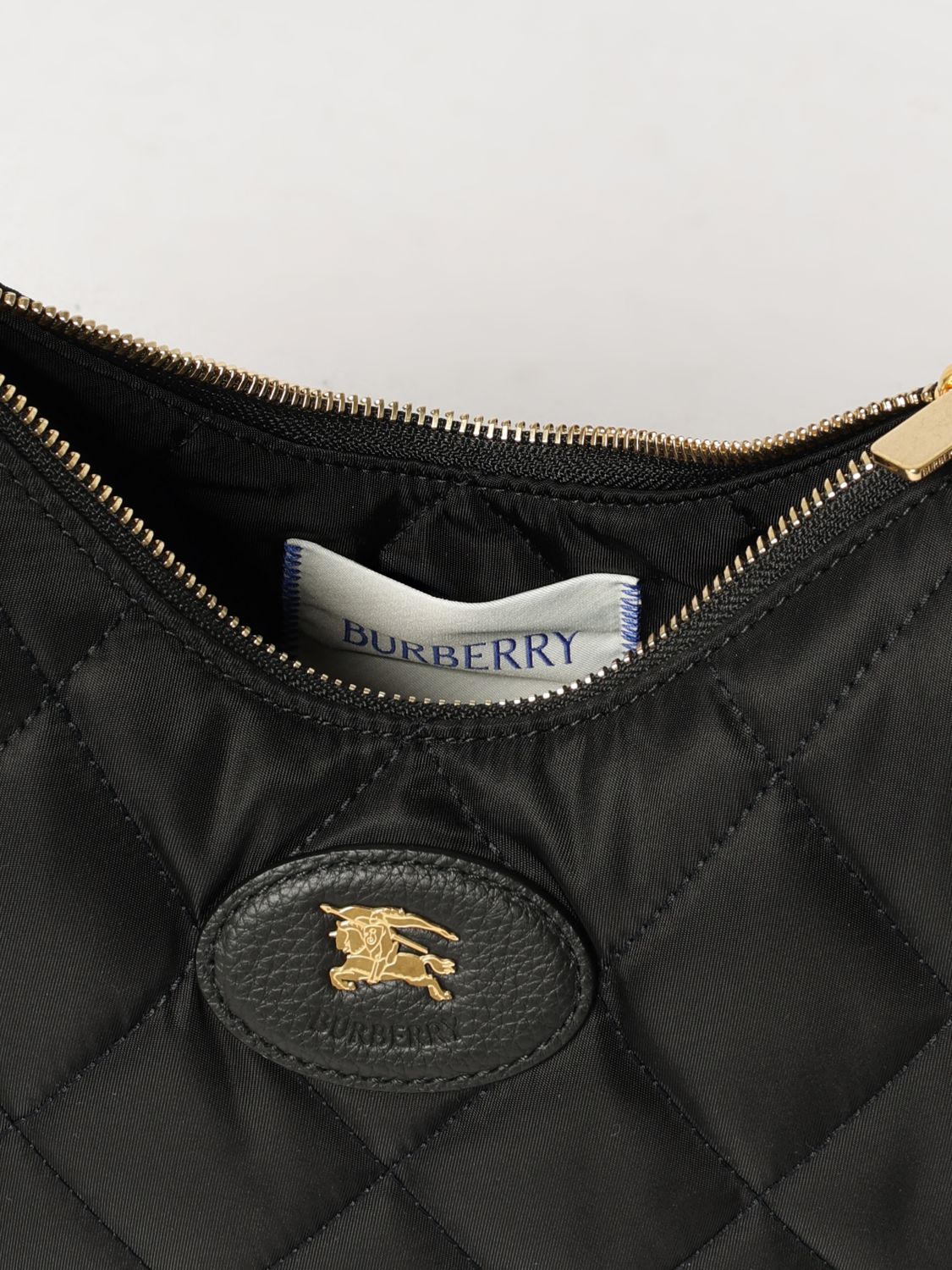 horseshoe quilted nylon twill shoulder bag with ekd logo