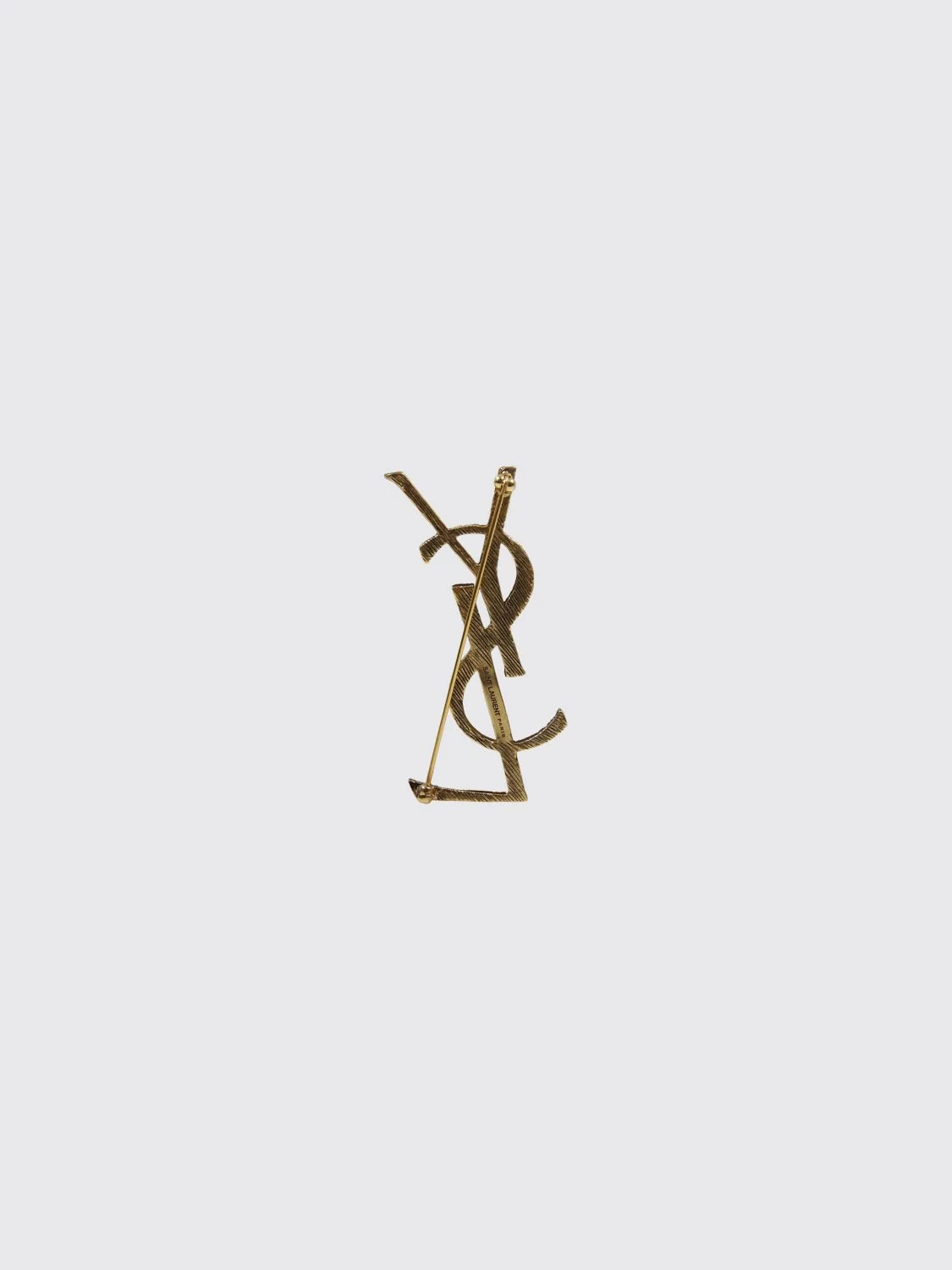 ysl monogram brooch in brushed brass with a gold-finish