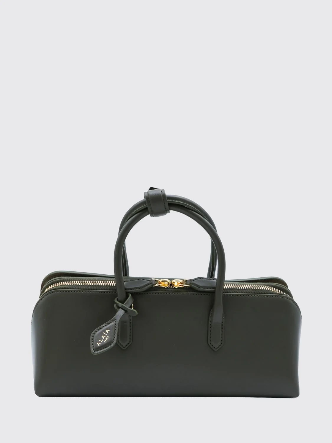 small leather handbag with double tubular handle and logo charm