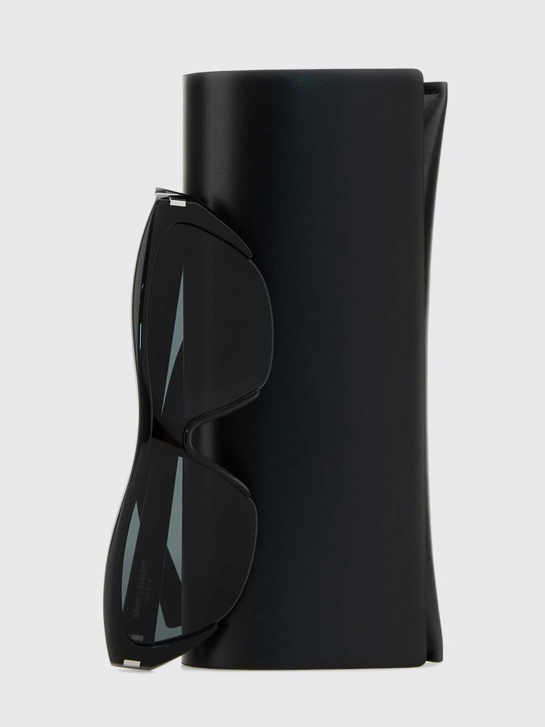 black acetate cat-eye sunglasses with flared shape and nylon lenses