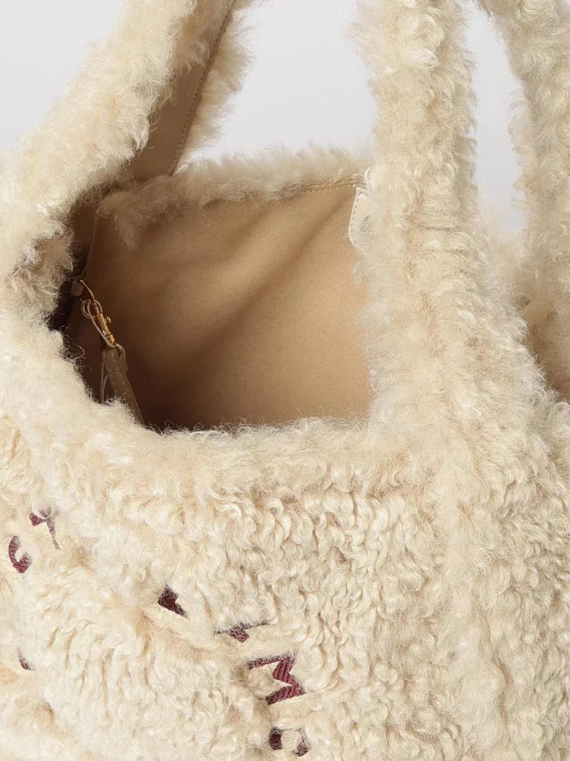 shearling shoulder bag with removable pouch