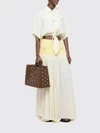 1969 raffia and leather tote bag with metallic rings