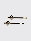 ff monogram hair clip in gold-tone brass with rhinestones