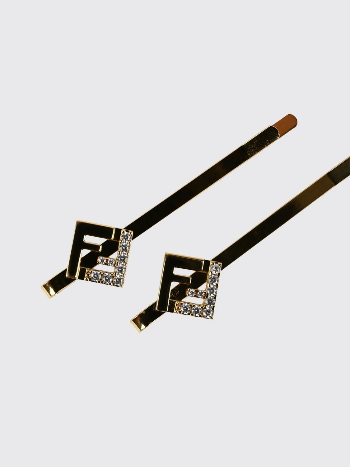 ff monogram hair clip in gold-tone brass with rhinestones