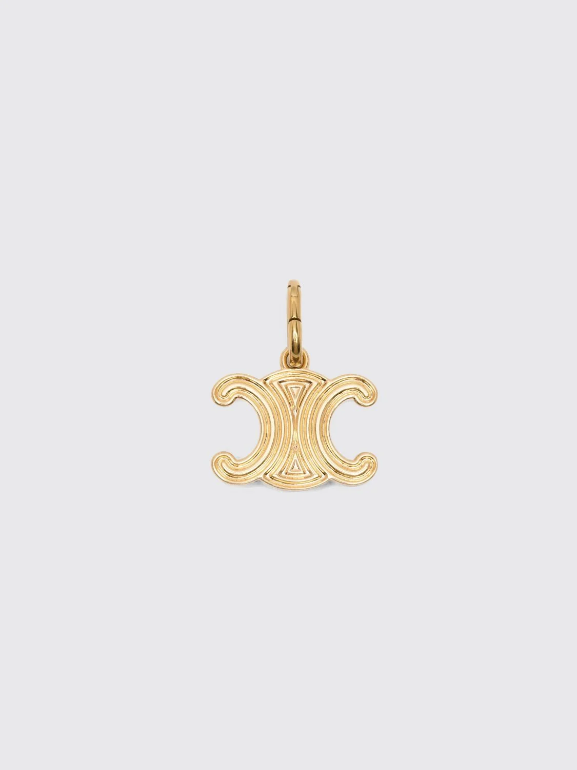 CELINE OS triomphe monogram pendant in two-tone gold and silver finish brass