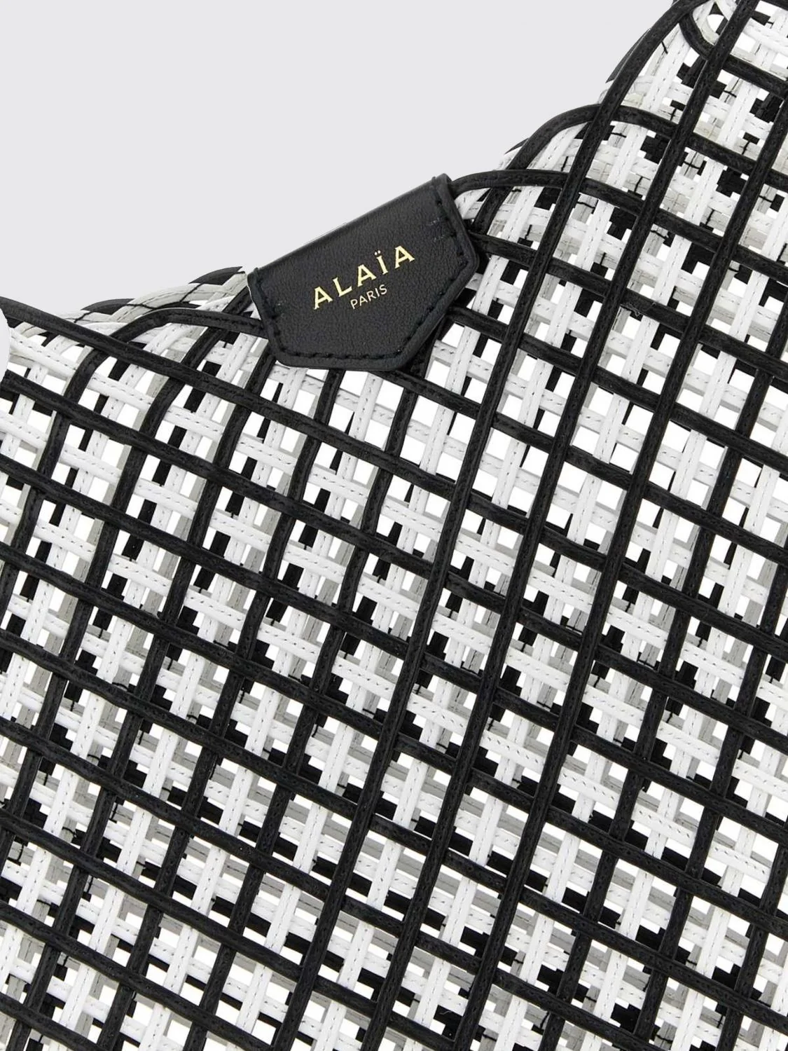 one piece perforated leather tote bag with inner pouch