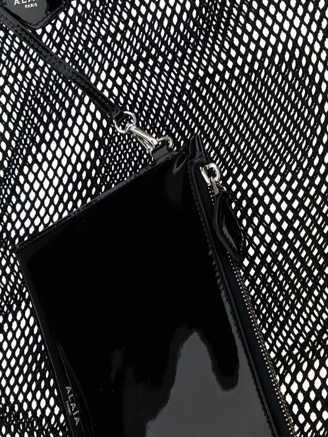 one piece perforated polyester tote bag with leather trim