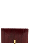 the giuseppe zanotti tuxedo clutch defines evening elegance through a structur