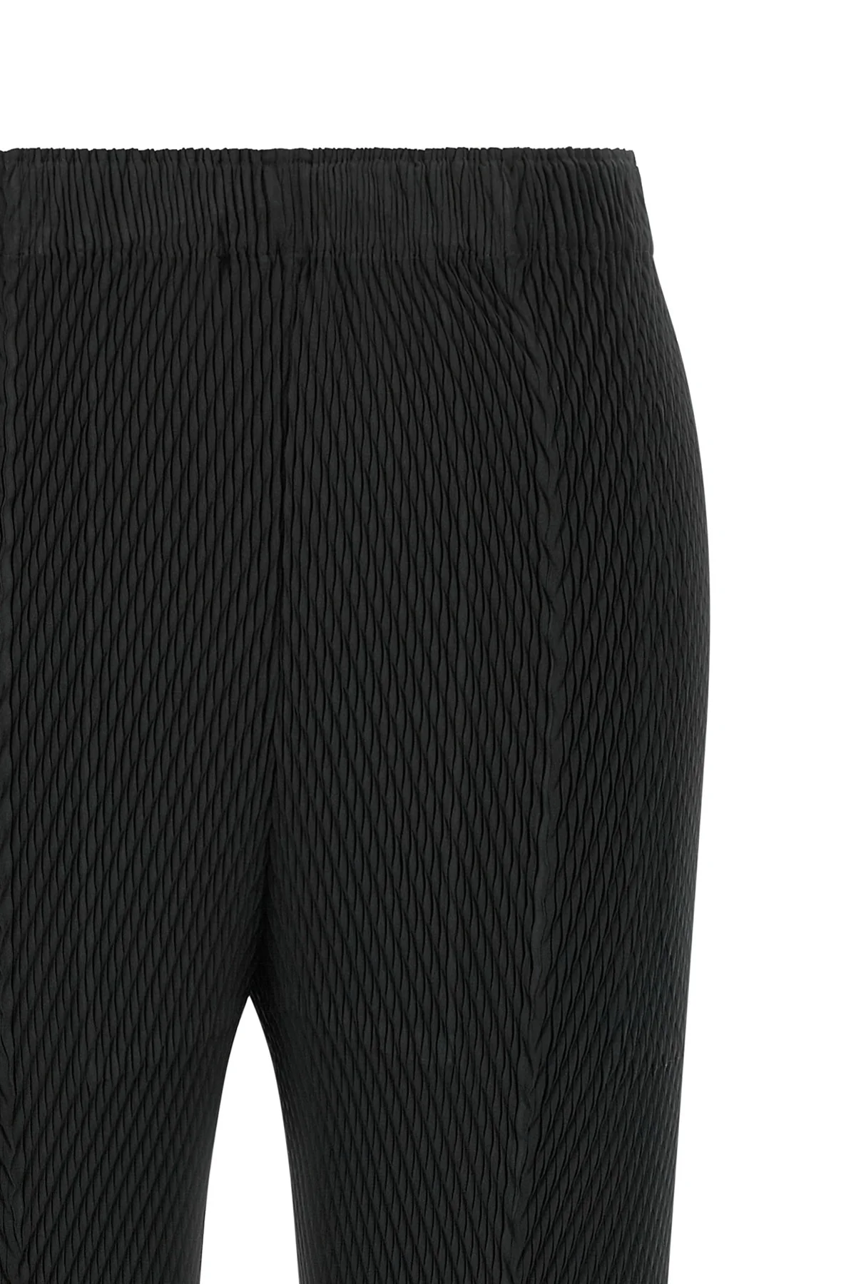 the rhombus pleats issey miyake cropped pants redefine the silhouette through