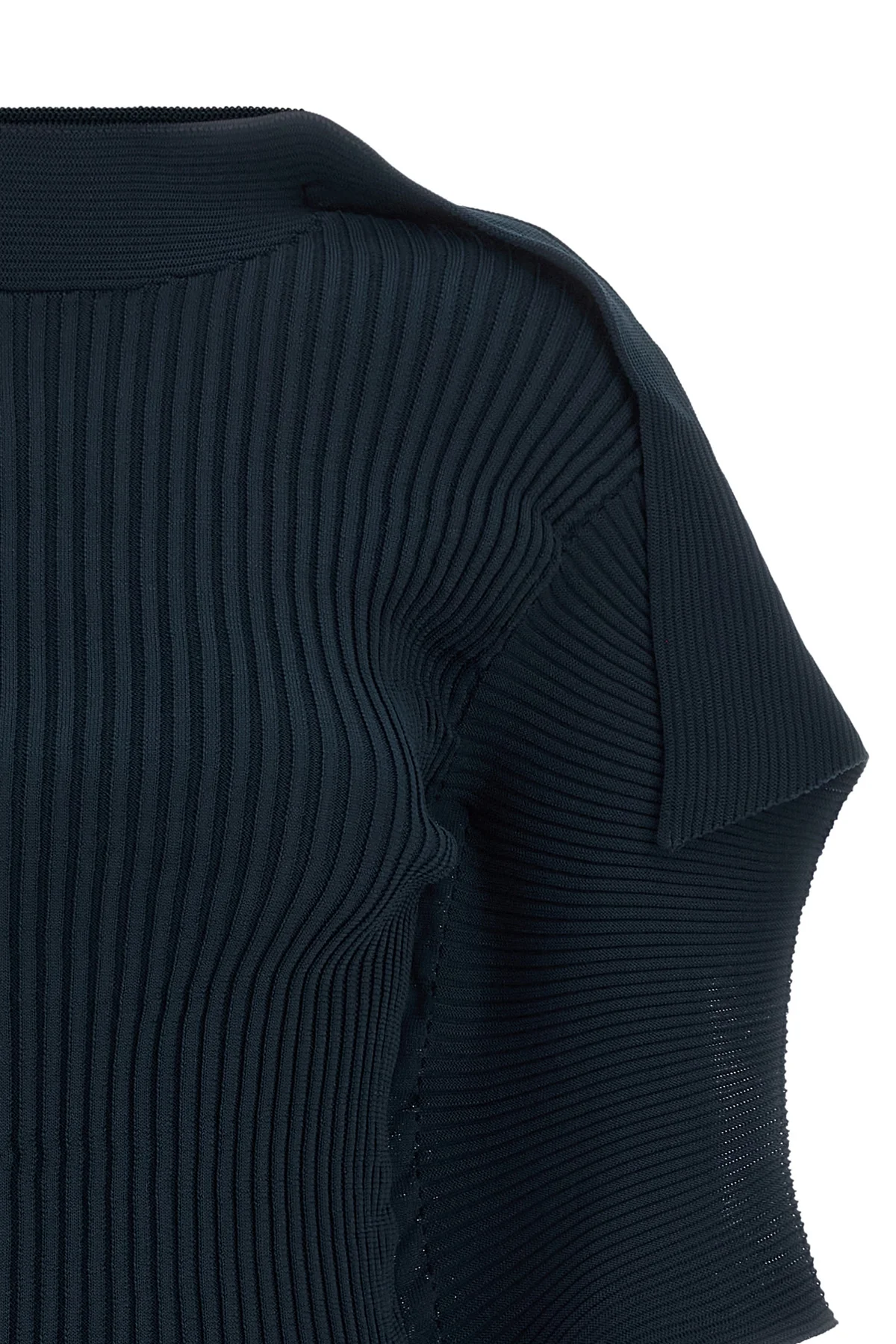 the prance top issey miyake redefines volumes through rigorous vertical pleats