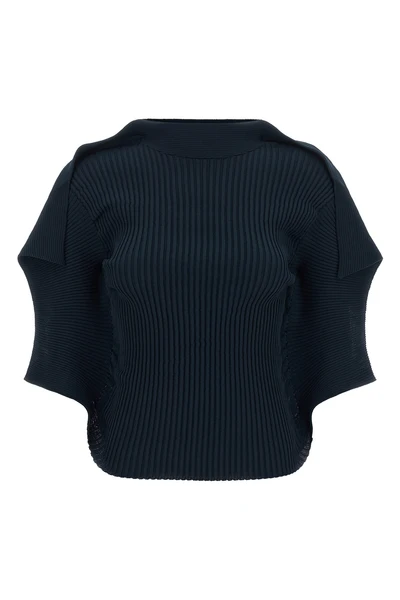 the prance top issey miyake redefines volumes through rigorous vertical pleats