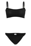 the hunza g iris bikini redefines beachwear aesthetics through an essential silh
