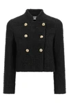 the balmain double-breasted tweed short jacket defines the wardrobe through a ri