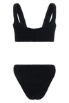 the hunza g julia bikini redefines beachwear aesthetics through its iconic thr
