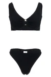 the hunza g julia bikini redefines beachwear aesthetics through its iconic thr