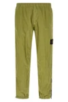 3100035 joggers in stone island nylon metal fabric subjected to a double wrink