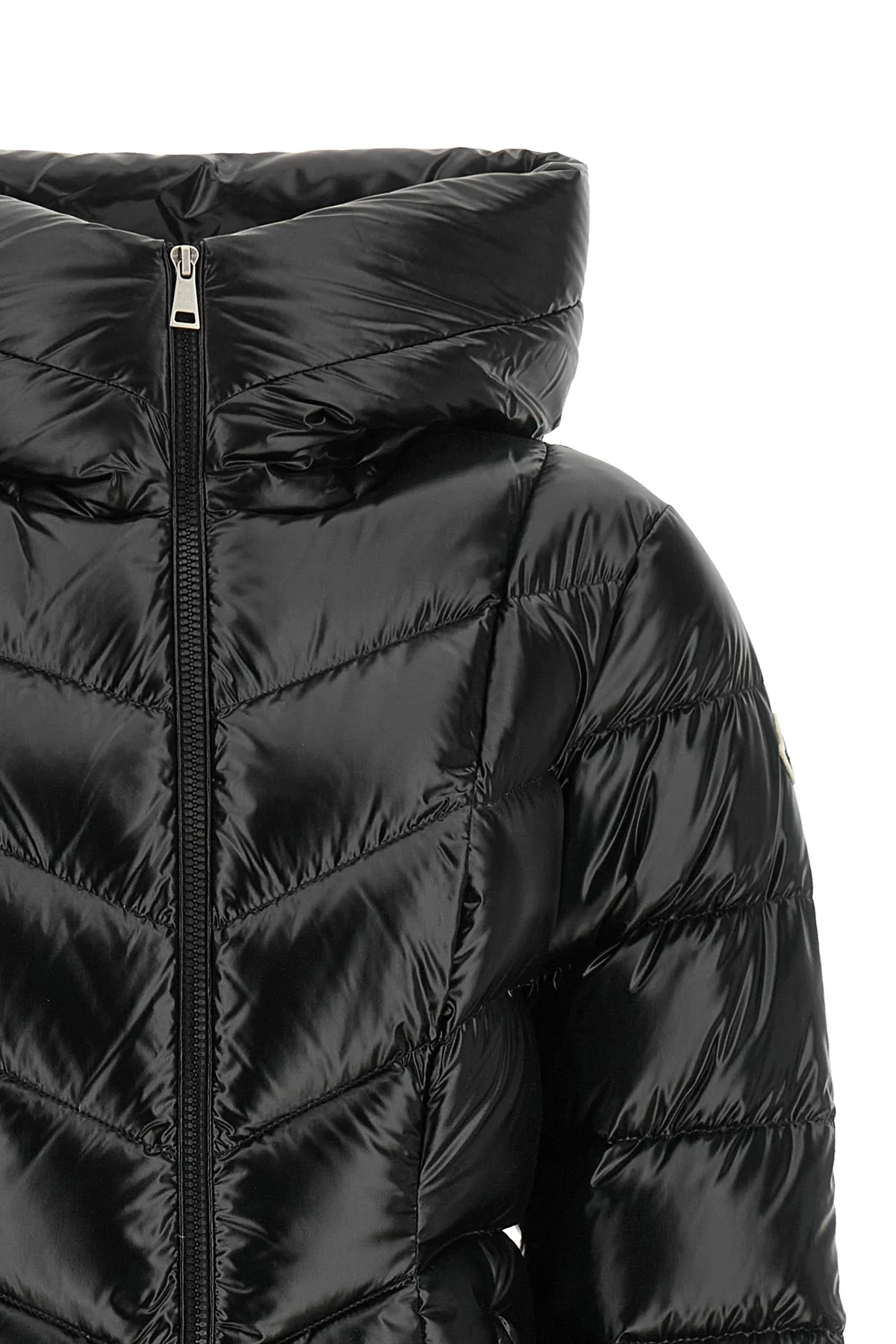 the moncler marusse down jacket redefines the codes of outerwear through a struc