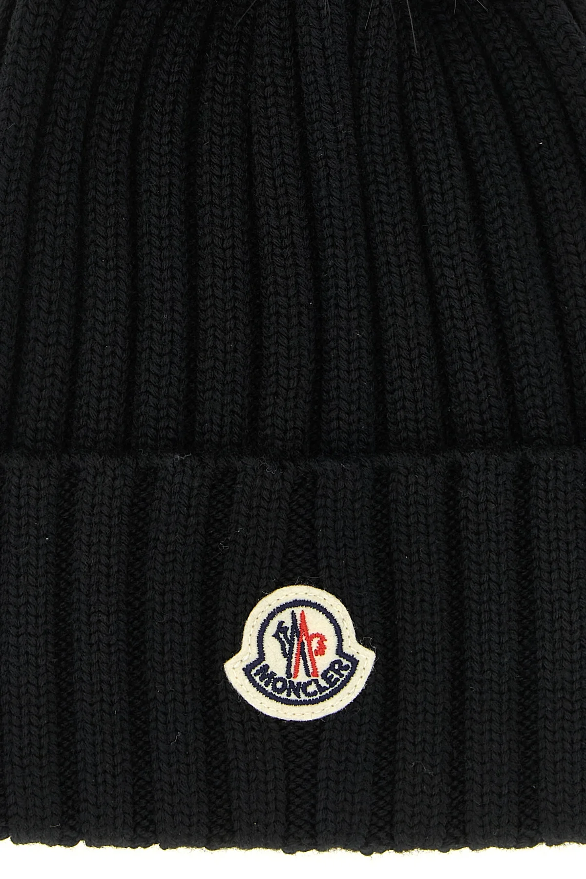 the moncler pure virgin wool beanie represents a perfect synthesis between therm