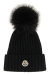 the moncler pure virgin wool beanie represents a perfect synthesis between therm
